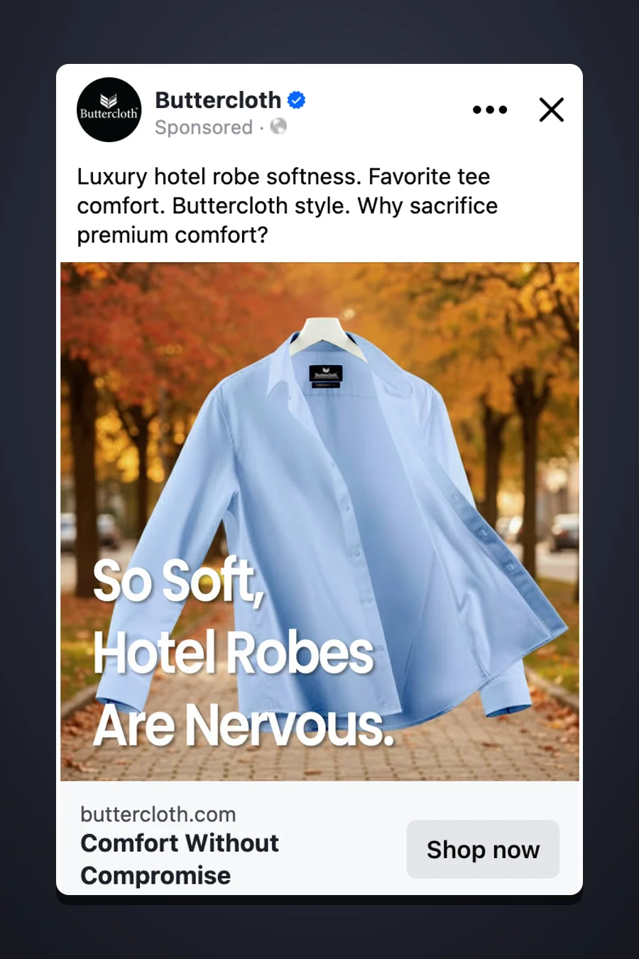 Buttercloth Facebook ad DYODE ran: an open light blue shirt on autumn pavement, headline 'So Soft, Hotel Robes Are Nervous'