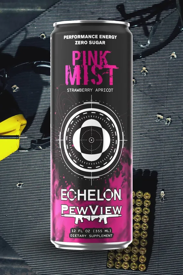 Echelon Pink Mist strawberry apricot can on a shooting range mat beside brass casings