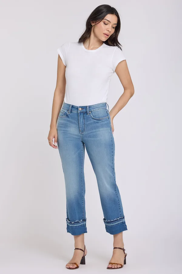 A model wearing NYDJ light-wash cropped jeans