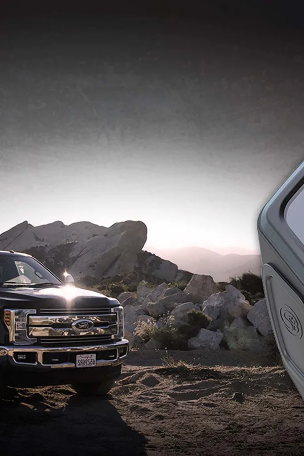 An S&B-equipped truck in the desert at dusk