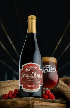 Bragg Racer bourbon barrel-aged ale bottle and tulip glass