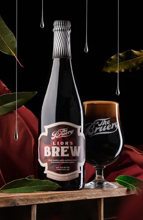 Lion's Brew imperial stout bottle and tulip glass